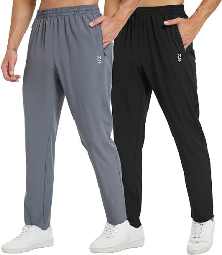 Men's athletic joggers in grey and black, featuring elastic waistband and ankle cuffs, paired with white trainers