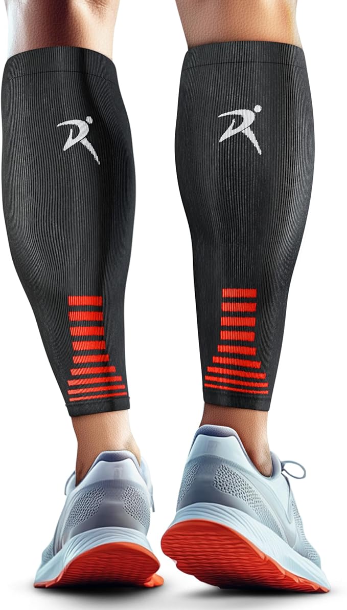 Man wearing black and red compression socks with athletic shoes, viewed from behind